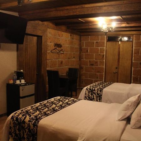 Hotel Real Nirvana เตโกซาอุตลา ภายนอก รูปภาพ
