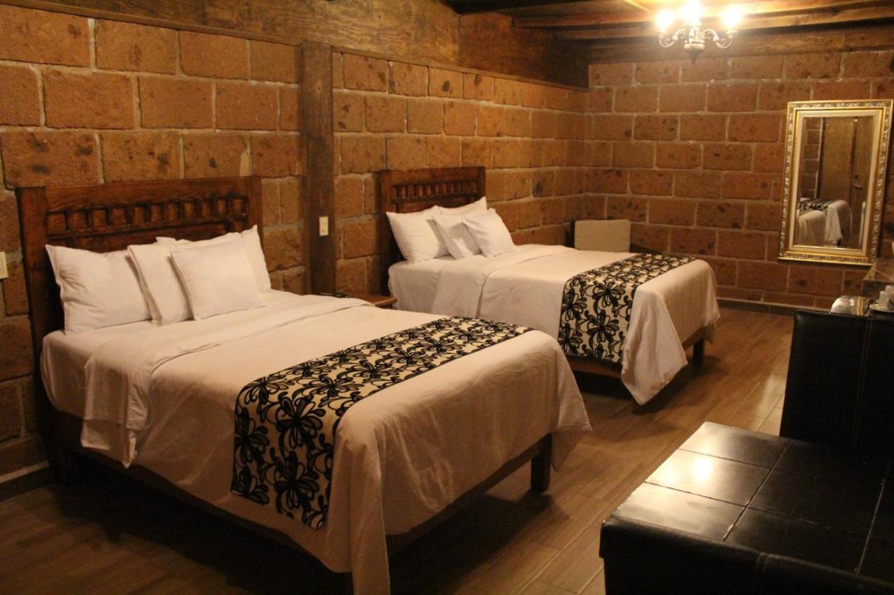 Hotel Real Nirvana เตโกซาอุตลา ภายนอก รูปภาพ
