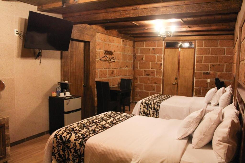 Hotel Real Nirvana เตโกซาอุตลา ภายนอก รูปภาพ
