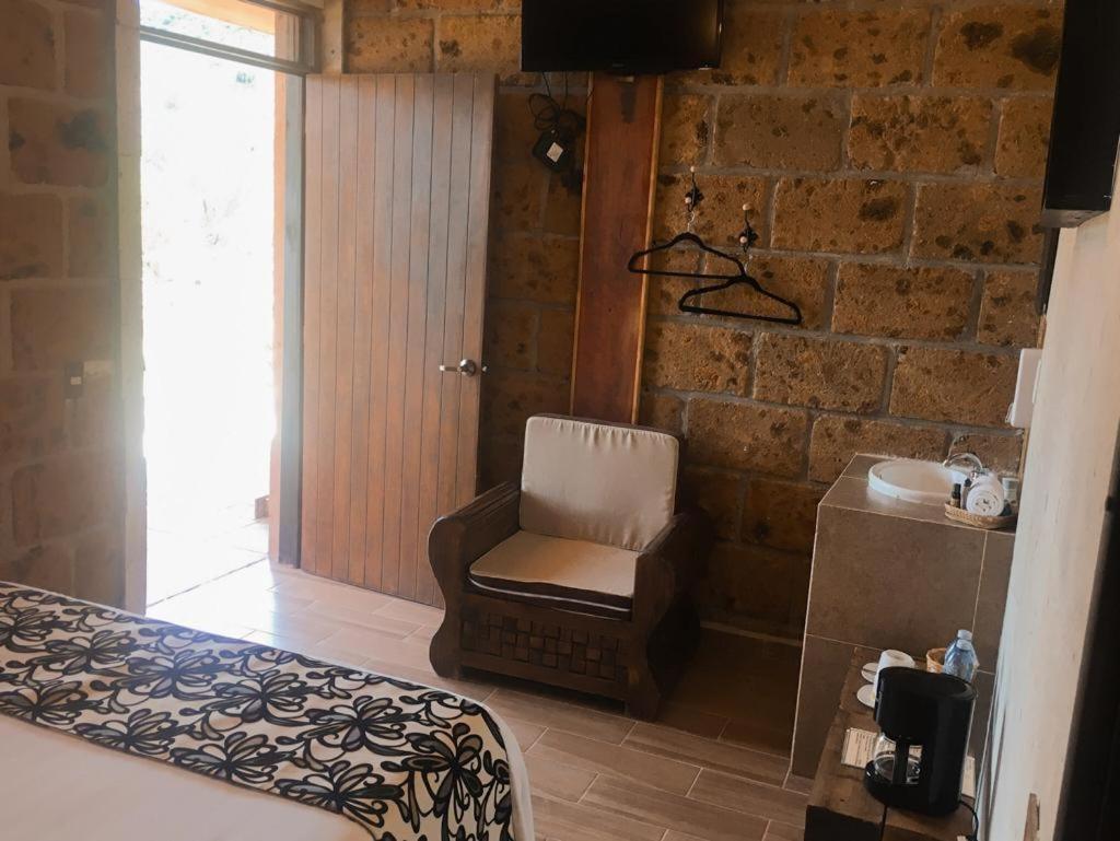 Hotel Real Nirvana เตโกซาอุตลา ภายนอก รูปภาพ
